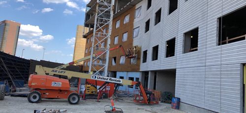 Staining Wall Panels, Boom Lift
Site
Sundek
